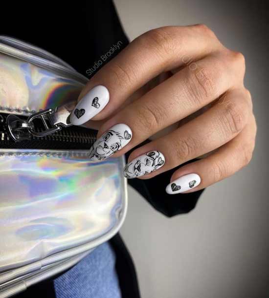 Manucure blanche avec coeurs pour le 14 février