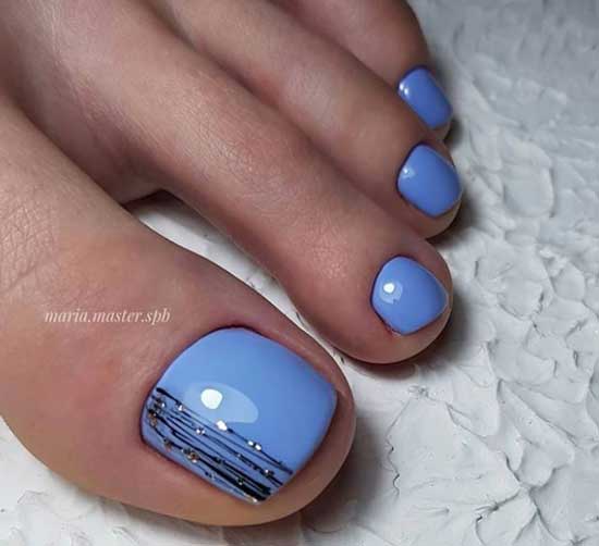 Pédicure bleue avec toile d'araignée