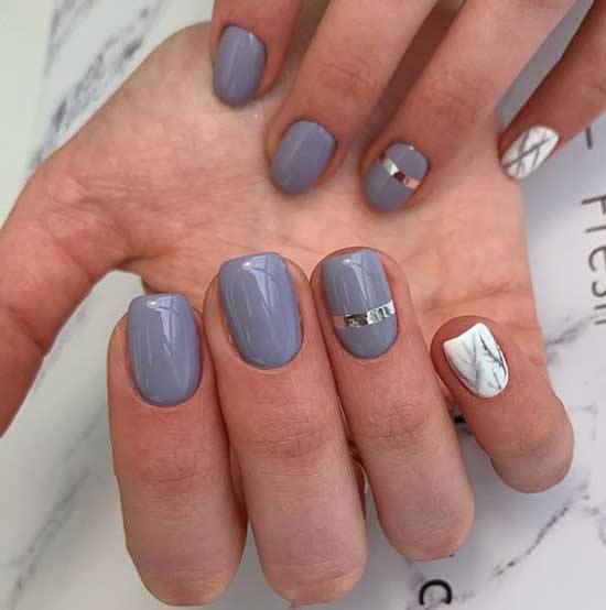 Manucure en gris avec un accent