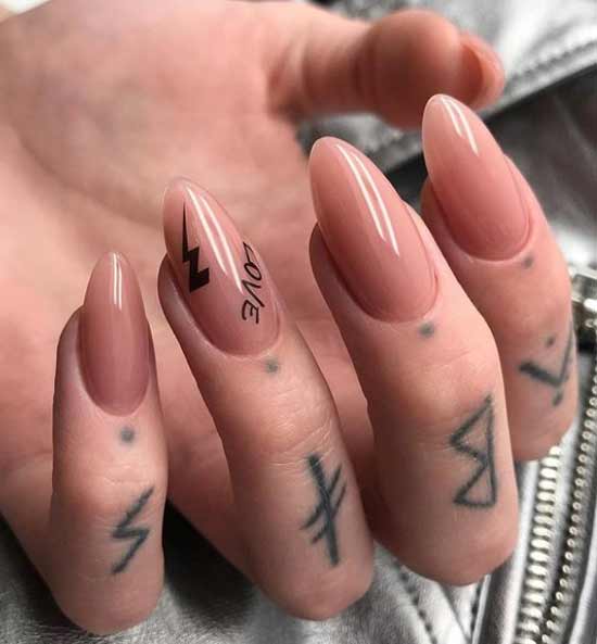 Manucure simple avec lettrage et fermeture éclair graphique