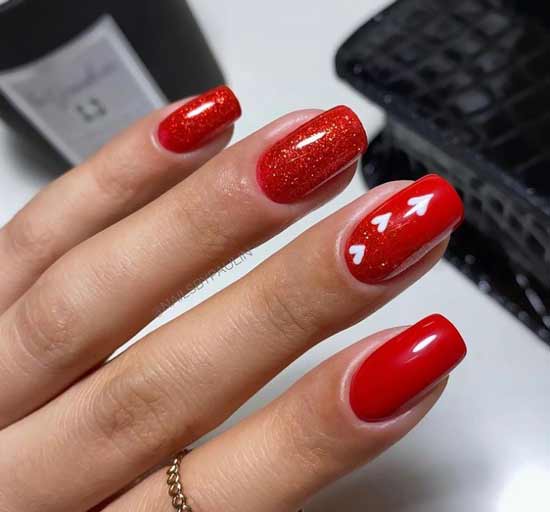 Manucure rouge avec coeur blanc