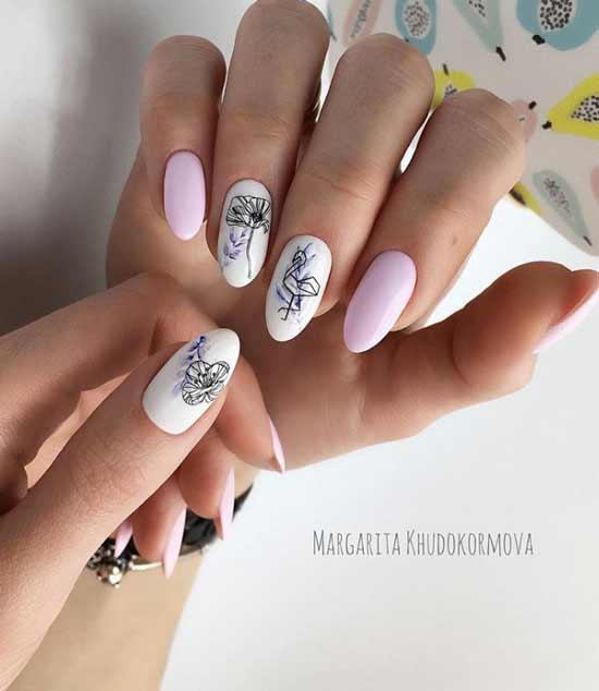 Manucure rose et blanche avec un motif