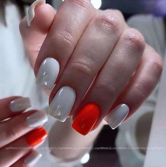 Blanc bicolore avec manucure rouge