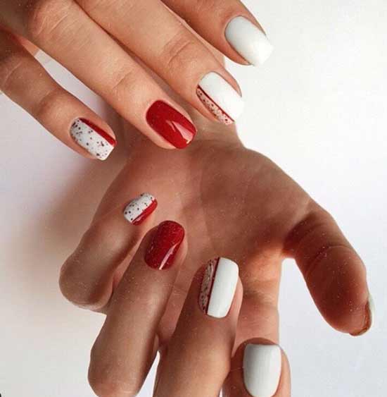 Géométrie en rouge et noir sur les ongles