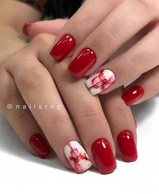 Manucure rouge foncé avec motif blanc