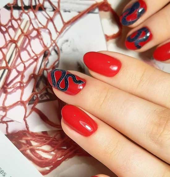 Serpent noir sur fond rouge