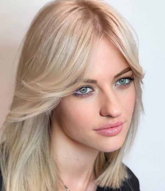 Longue frange 2026 : quelles coupes de cheveux pour porter une longue frange, photo