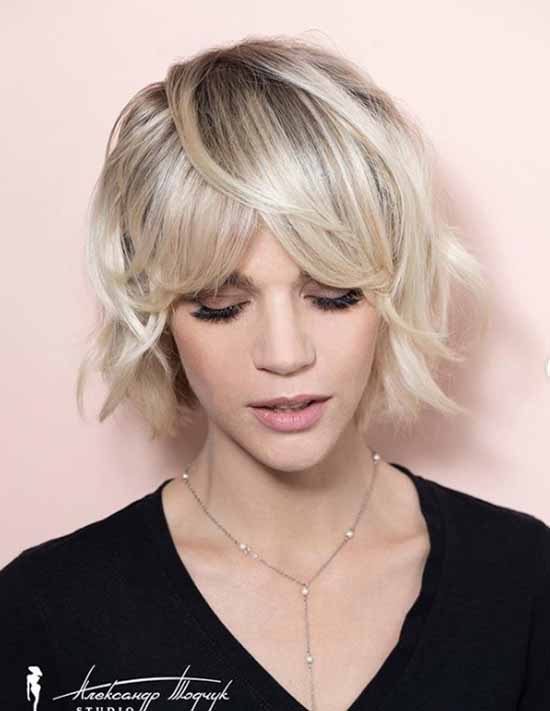 Longue frange 2026 : quelles coupes de cheveux pour porter une longue frange, photo