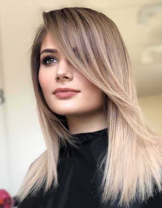 Longue frange 2026 : quelles coupes de cheveux pour porter une longue frange, photo