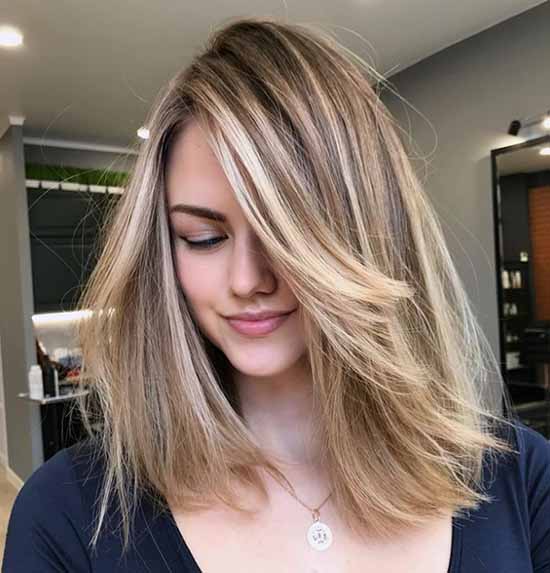 Longue frange 2026 : quelles coupes de cheveux pour porter une longue frange, photo