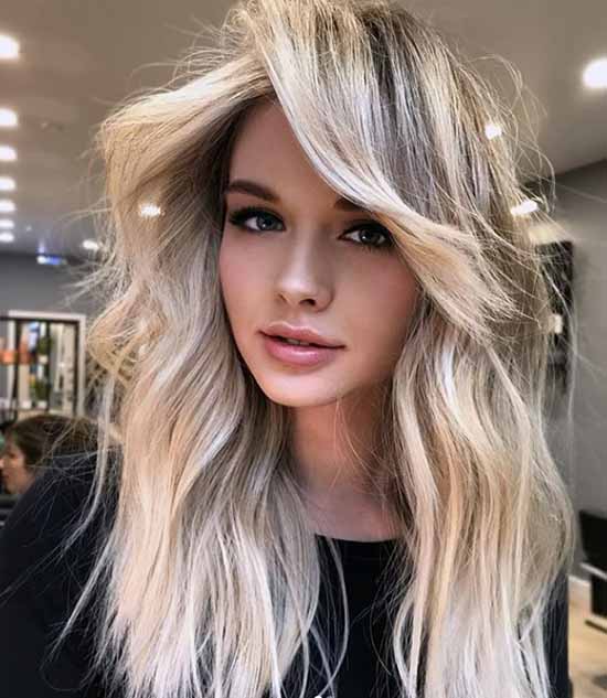 Longue frange 2026 : quelles coupes de cheveux pour porter une longue frange, photo