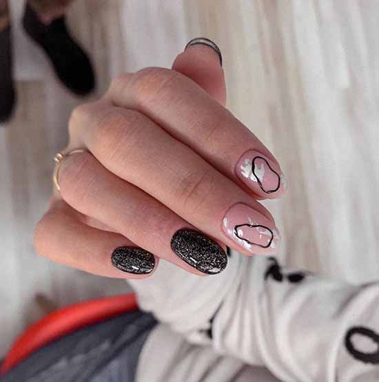 Ovale noir - manucure pailletée