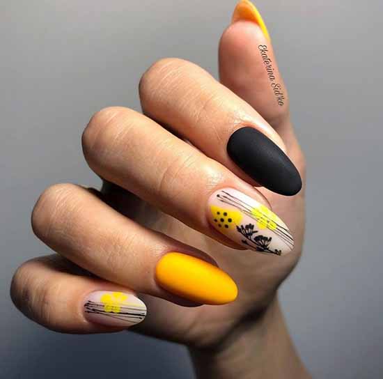 Manucure noire et jaune