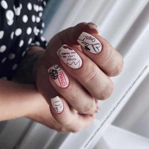 Conception d'ongles mat avec un coeur