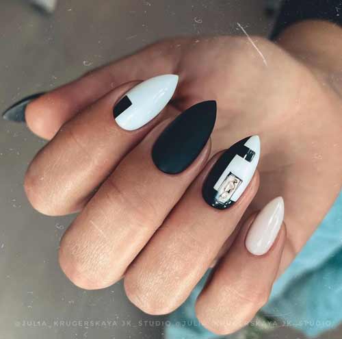 Ongles noirs et blancs pointus