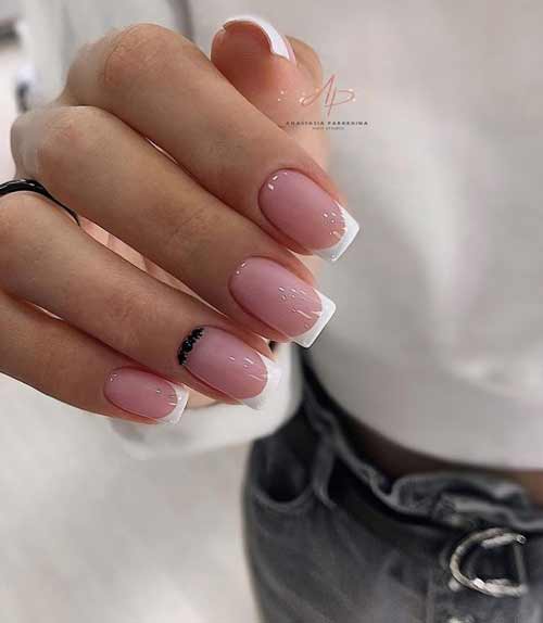 Veste blanche avec strass noirs