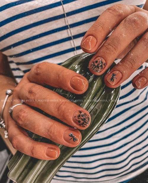 Manucure papillon 2026: nouvelles photos de conception