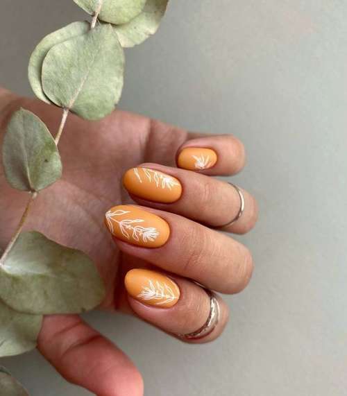 Manucure avec des feuilles: design 2025-2026, nouveaux articles sur la photo
