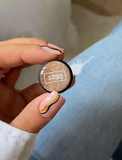 Manucure noir et or 2025-2026: nouvelles photos design