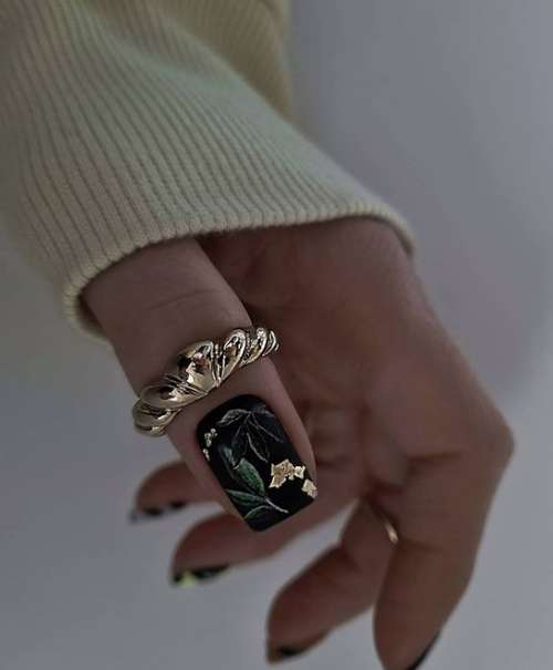 Manucure noir et or 2025-2026: nouvelles photos design